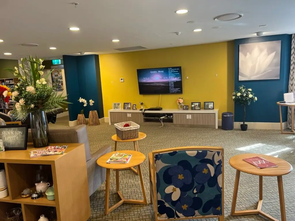 Internal renovation of a house living area with updated walls, lighting, and finishes